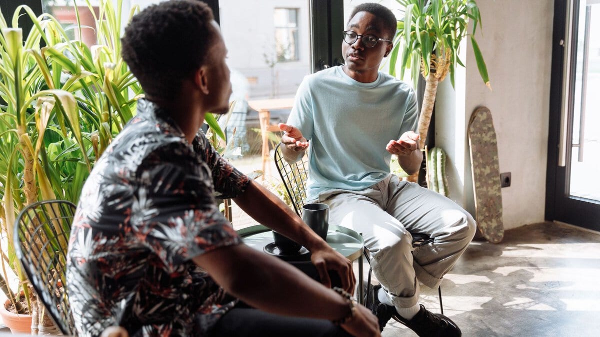 Friends talking over coffee