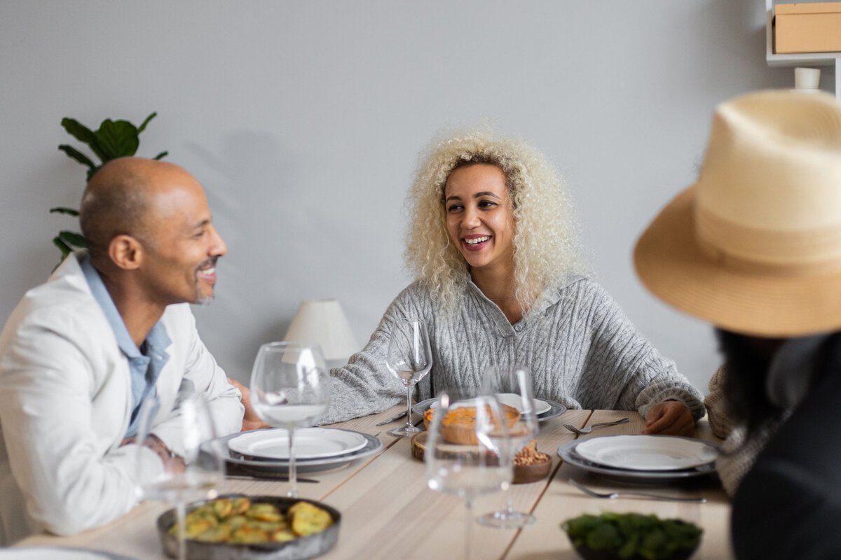 Friends sharing a meal and conversation