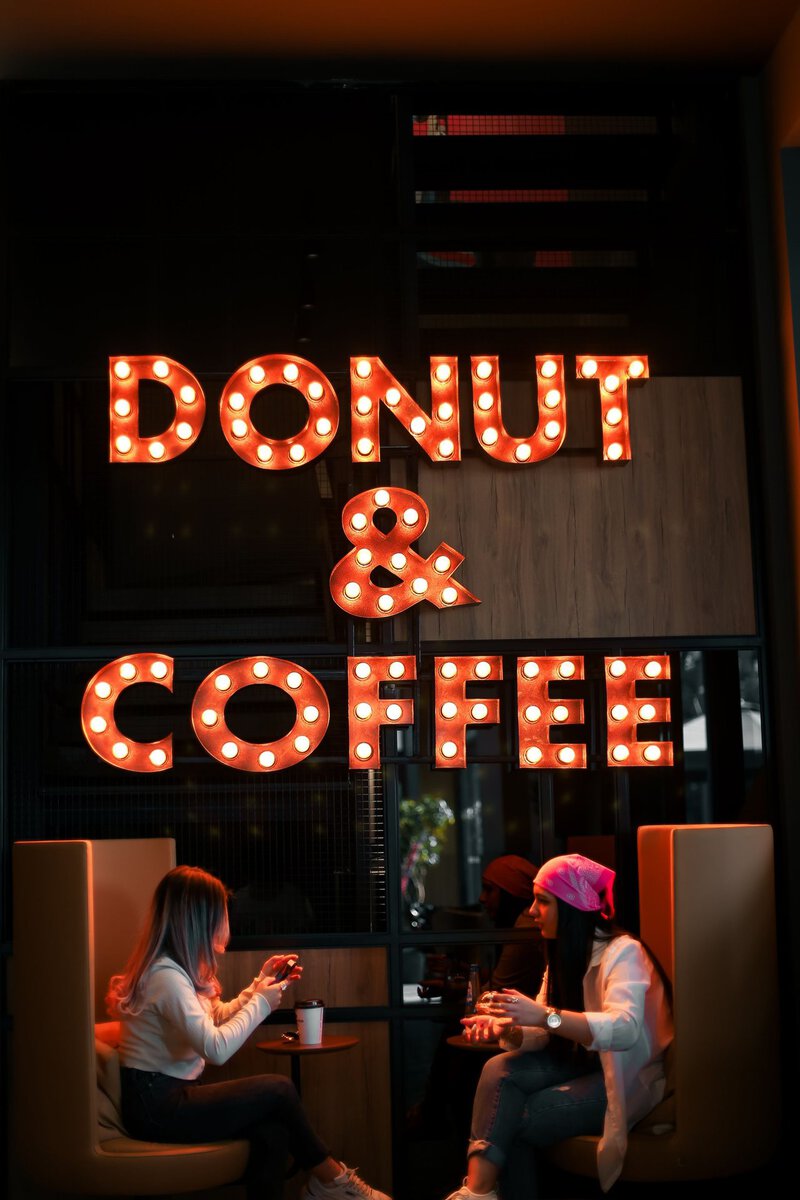 Friends having a conversation over coffee