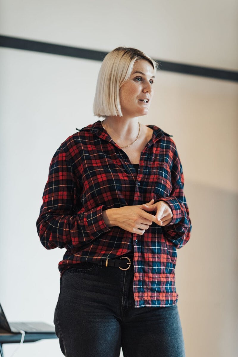 Woman speaking during a presentation
