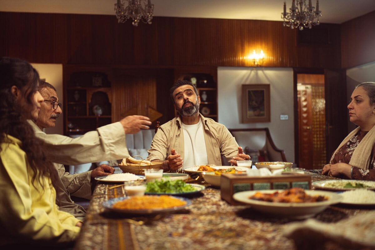 Family gathered around a dining table