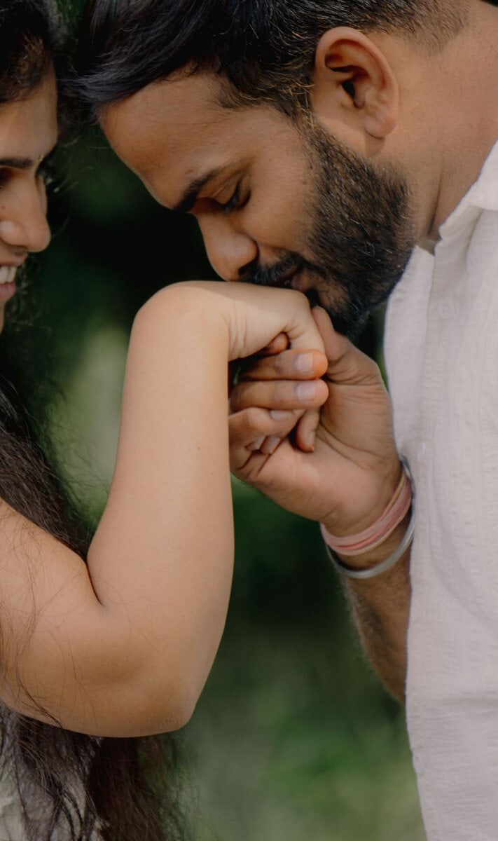 Couple sharing an affectionate moment outdoors