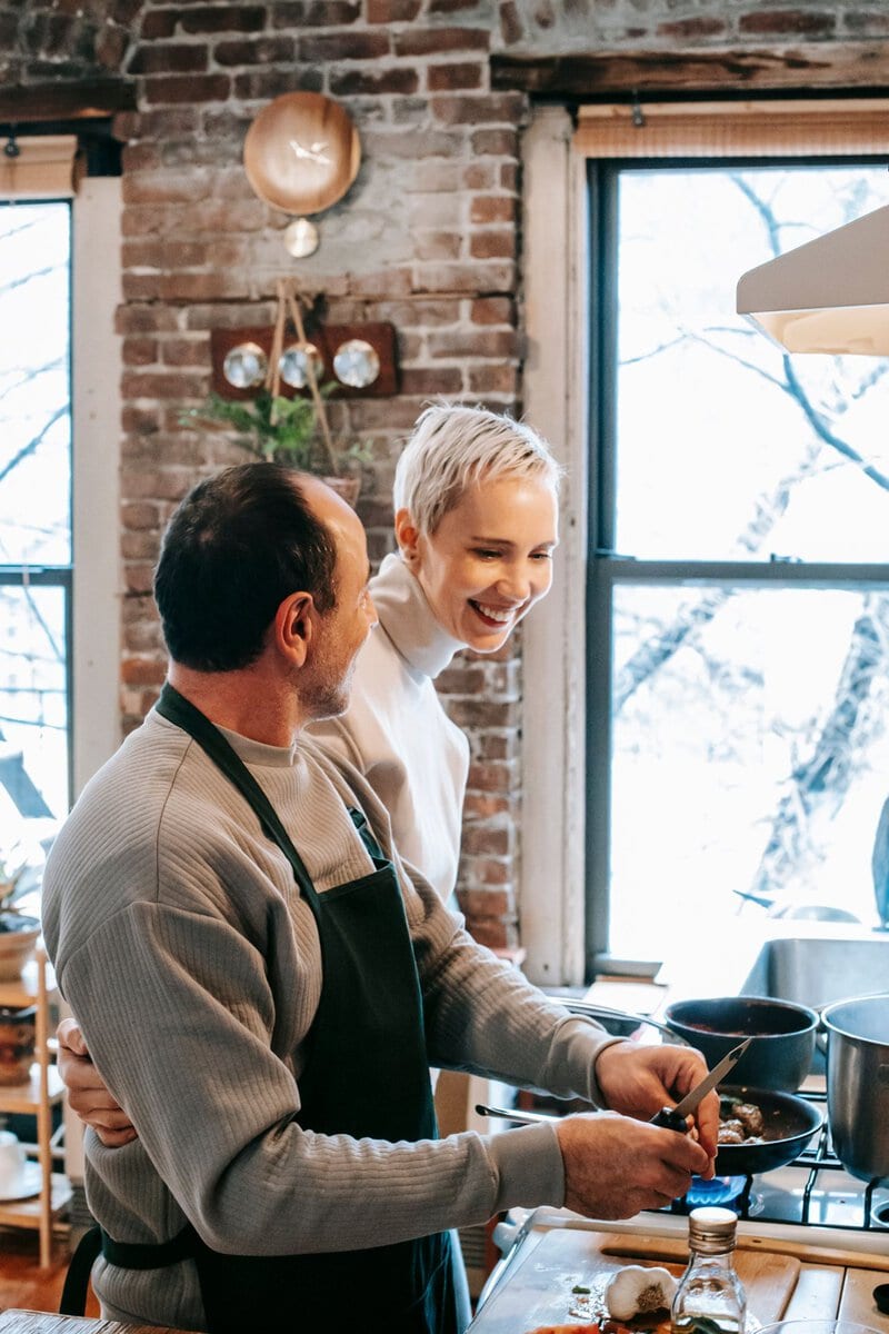 Couple preparing a meal together